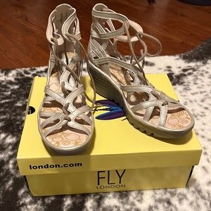 London Fly wedge heels.